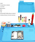 Heat Resistant Silicone Soldering Mat With Anti Static Magnetic Repair Station For Cell Phones Laptops And Watches Great For DIY Projects Pro Grade Multi Purpose Work Pad With Screw Slots And Accessory Compartments showcasing tools and a phone motherboard.