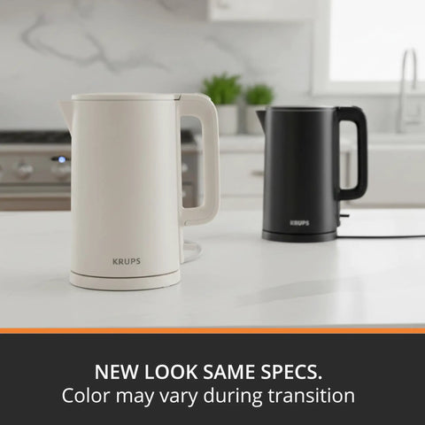 1.5L Cordless Electric Kettle With Cool Touch Exterior And Stainless Steel Interior Boils One Cup In 80 Seconds Double Wall Construction Auto Off Keep Warm Quick Boil Black White, showing two kettles on a kitchen counter.