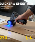 Cordless cutting tool with LED display, silver finish, handheld cutter cutting cardboard on a table.