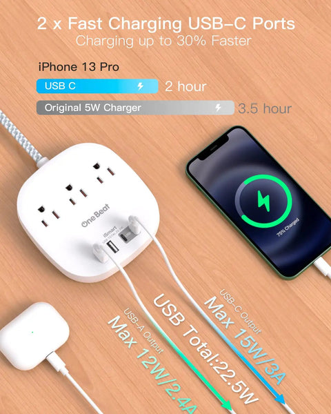 Ultra Thin 10 Foot Flat Plug Power Strip With 3 Outlets And 4 USB Ports Including 2 USB C next to charging smartphone on desk