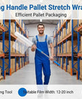 Heavy Duty Long Handle Pallet Stretch Wrap Dispenser For No Sweat Warehouse Hustle With Slick Spool Action And Easy Grip For Moving Frequent Loads And Packing Boxes Daily in a busy warehouse aisle.
