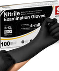 Heavy Duty Black Nitrile Gloves Built Tough For Medical And Industrial Work Top Shelf 4 Mil Disposable Shield being worn on hand.