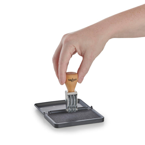 Vintage Pro Heavy Duty Date Stamp Workhorse Featuring Adjustable Mmm Dd Yyyy American Format in use with hand applying date.