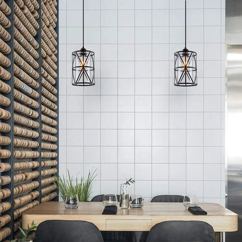 Black Industrial Metal Pendant Light With Clear Glass Shade For Kitchen Island Sink Counter And Dining Room over dining table.