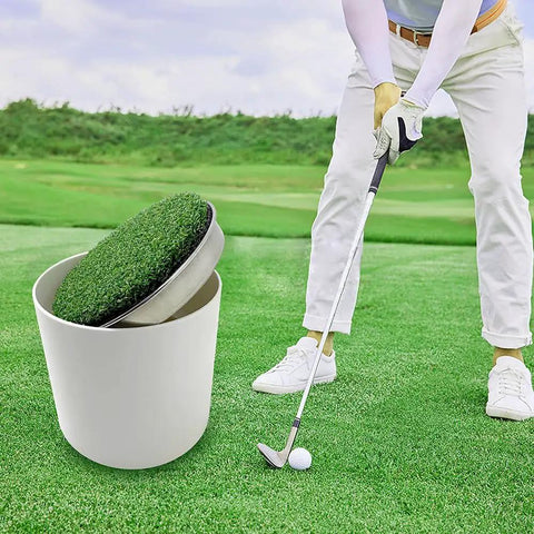 Golfer practicing with metal base golf hole cups for home putting practice, realistic lawn look, standard size on green turf.