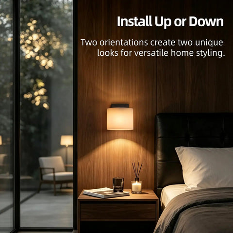 AuroraSpher Indoor Hardwired Modern Milky White Acrylic Black Wall Sconce installed above nightstand in bedroom setting.