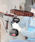 Jiminhuixin Cordless Fish Tape Kit With Brushless Motor 21V Electric Wire Threader For Conduit Wiring in use by a worker.