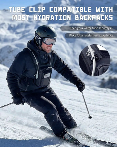 Skier with Go To 2L Hydration Bladder Kit With Cleaning Kit for Hiking Backpacks, tube clip visible, snowy mountain background