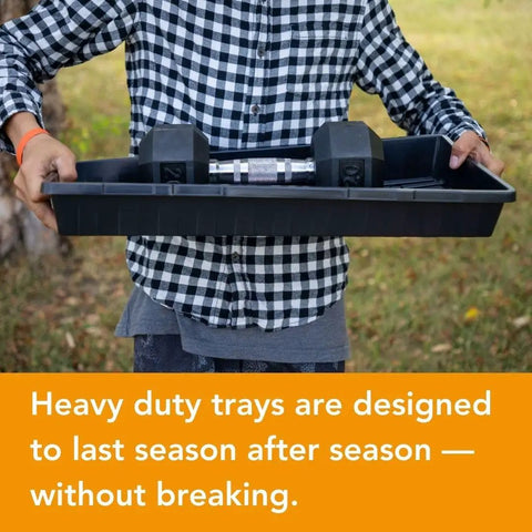Person holding Extra Tough No Holes Seed Starting Trays 5 Pack Built To Last Durable BPA Free Plastic Nursery Flats outdoors
