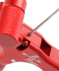 Close-up of red 4-Finger Compound Bow Release Trigger With 360 Degree Rotating Thumb Release Aid showing mechanism detail.