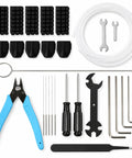 Top Shelf 3D Printer Tool Kit Featuring Slick Nozzle Cleaning Brushes And Heavy Duty Clog Poke Needles For Spotless Hotend Care And Hassle Free Daily Maintenance Gear, assorted tools and accessories laid out.
