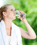 Woman drinking filtered water, highlighting Replacement Filter For Waterdrop WD PF 01A Plus Pitchers And Dispensers That Reduces PFOA PFOS