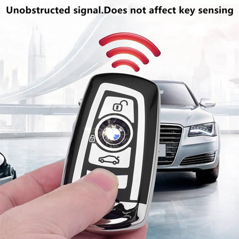 BMW Key Fob Cover With Soft TPU Case Advanced Silver Key Box For X1 X3 X5 X6 And More in hand, signal icon visible
