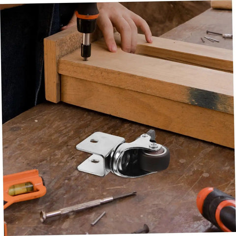 4 Pack Heavy Duty Swivel Casters Rolling Smooth As Silk With Retractable Kickback Locks For Living Room Furniture Workshop Carts And Storage Lockers Rock Solid Setup installed on wooden workbench with tools.