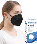 Person wearing a black KN95 5-ply mask and showing the box of 50-pack KN95 Face Mask 5 Ply Protection With 95 Percent Filtration For Daily Use