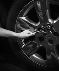 Person using 3 Piece Ratchet Set with 1/4 3/8 and 1/2 Inch Drive Ratchets 72 Tooth Quick Release Reversible Socket Wrench on car wheel