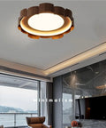 Top Shelf Wood Grain Led Ceiling Light Fixture, Solid Flush Mount With Mid Century Modern Vibe illuminating a stylish living room ceiling.