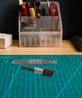Super Cool Steel Screw Extractor Kit With Hex Shank Perfect For Removing Stripped Bolts And Broken Screws Easy DIY Home Repair Tools That Give You Total Control Over Messy Jobs No More Stuck Threads Here, two steel extractors on cutting mat