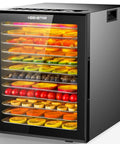 Food Dehydrator For Jerky And More With 12 Stainless Steel Trays filled with assorted fruits and veggies