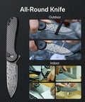 Elementum II Folding Pocket Knife With 2.96 Inch Damascus Blade And Carbon Fiber Handle, Slick Flipper Action With Ceramic Ball Bearing Pivot, Button Lock, Everyday Carry Ready For Daily Tasks shown open and in use