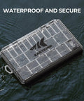 HyperSeal Waterproof Tackle Box For 3600 And 3700 Trays with Removable Dividers floating on water, black color.