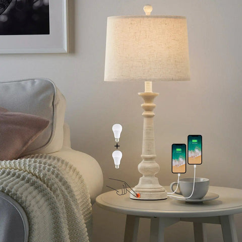 Set Of 2 27.75 Inch 3 Way Dimmable Touch Table Lamps With USB Ports Bulb Included Linen Washed Finish Rustic Farmhouse Nightstand Lighting For Living Room And Bedroom displayed on table next to sofa with two phones charging