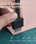 Close-up of Super Handy Leather Hole Punch Tool Set with Interchangeable 2 4 6 prong attachments punching leather.