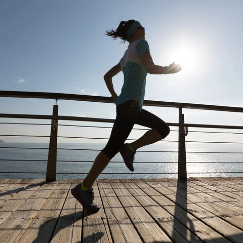 Runner on boardwalk near handrails with 1/8 Inch Black Stainless Steel Cable Railing Wire, 150 Ft Long, 7x7 Strand, Rustproof