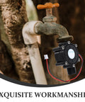 Close-up of a Two Pack Portable Mini Hydro Turbine Generator for water power DIY projects next to an outdoor faucet.