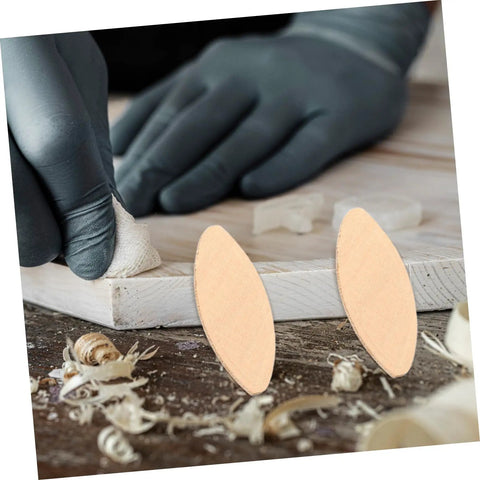 Top Shelf Woodworking Biscuit Joint Kit Brings You One Hundred Heavy Duty Biscuit Plates For Rock Solid Plywood Furniture Build Outs That Truly Deliver Straight Up Quality Results - close-up of two biscuit plates