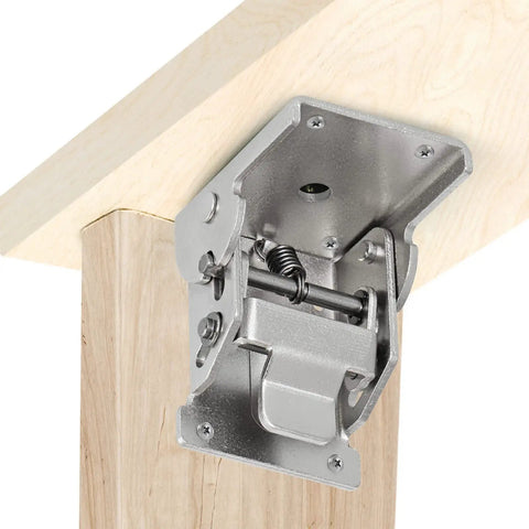 Close-up view of Heavy Duty Folding Brackets For Table Legs And Wall Shelves With Self Locking Hinges mounted on wood.