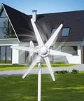 High Efficiency 800W Wind Turbine Kit With Six Blade Rotor For Home Farm RV And Marine Use 12V 24V System Electromagnetic Generator For Sustainable Power Production Plug And Play Ready installed in a backyard.