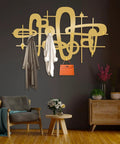 Slick Mid Century Metal Coat Rack With Abstract Wall Hooks Top Shelf Luxury Entryway Decor showcasing coats and a purse.