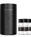 No Water Needed Nebulizing Diffuser Starter Kit With Battery Powered Mini Scent Machine Including 3x20ml Essential Oils For Home Car Office Use Portable Black, matte black diffuser and 3 essential oil bottles.