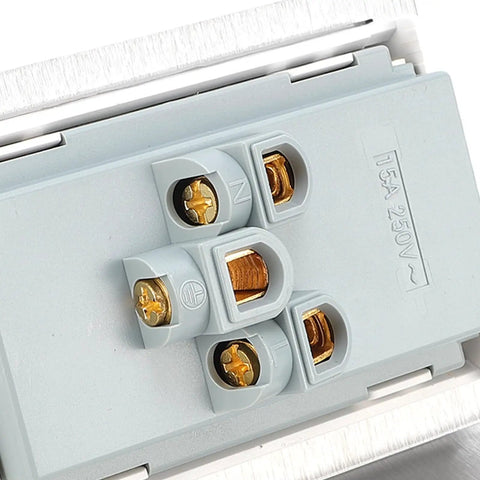 Close-up of Super Sleek Recessed Floor Electrical Outlet Kit With Pull Up Waterproof Cover showing wiring terminals and details.
