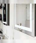 Close-up of LED Bathroom Mirror With Anti Fog, Wall Mounted, 24x30 Inches, showing lit edge to edge LED lighting.