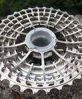 Ultralight 11 Speed Road Bike Cassette 11-34T HG Freehub Compatible With Shimano and SRAM, top view on stone surface