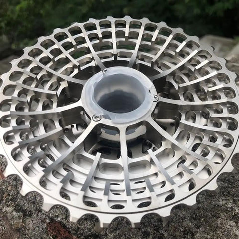 Ultralight 11 Speed Road Bike Cassette 11-34T HG Freehub Compatible With Shimano and SRAM, top view on stone surface