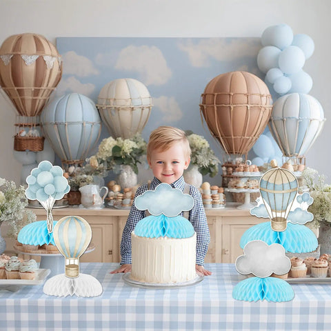 Table with Blue Hot Air Balloon Honeycomb Centerpieces For Tables With Clouds Travel Adventure Theme 8 Piece Set at kids party