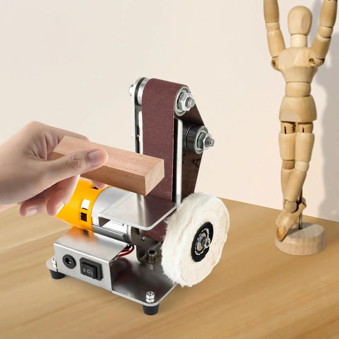 Mini Belt Sander Grinder With 7 Speed Adjustable Settings For Metal And Wood in use, sanding wood block with polishing wheel.