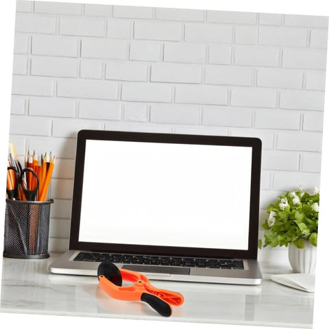 Phone Screen Repair Kit With Suction Cup Pliers For Quick Screen Opening on desk beside laptop and plant