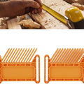 Heavy Duty Rock Solid Woodworking Featherboard Premium Steel Adjustable Stackable Safety Clamps For Table Saw Router Table Band Saw Save Knuckles And Workshop Flow Tight, orange dual featherboard clamps on a workbench.