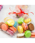 Heckin Great Cellophane Treat Bags 7 X 14 Inches With Gold Twist Ties 100 Pack Sturdy Opp Material Perfect For Cookies Candy Snacks Chocolate Marshmallow Wrapping with colorful macarons.