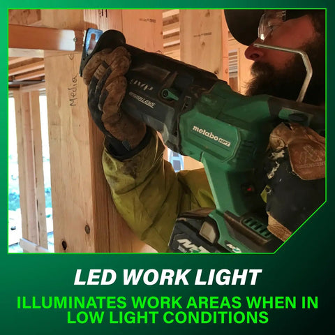 Worker using Cordless Reciprocating Saw With 36V MultiVolt, 4-Stage Speed Selector, Metal Rafter Hook in low light