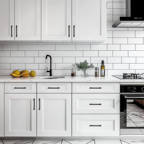Modern kitchen with white cabinets featuring Black Cabinet Pulls Six And One Quarter Inch Hole Spacing Wide Base Kitchen Cabinet Handles.