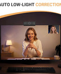 Ultra Crisp 1080P HD Webcam For Pc showing a woman on video call with low-light correction, laptop setup, sleek design.