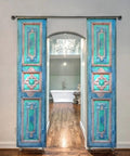 Hand Carved Authentic Barn Doors Custom Size For Interior Or Exterior Entrance Front Doors Double Or Single Hinged Or Sliding Rustic Farmhouse Vibe Antique Style Door No Glass Or Hardware Included, featuring vibrant blue panels in hallway.