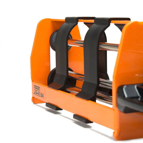 Close-up of Pro Grade Dual Component Cartridge Gun frame, orange and black, for 400 ml cartridges with high thrust, epoxy and foam use.