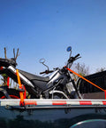 Heavy Duty Ratchet Tie Down Straps With Hooks 1 Inch Wide 10 Feet Long Pack Of 6 securing a motorcycle on a truck bed