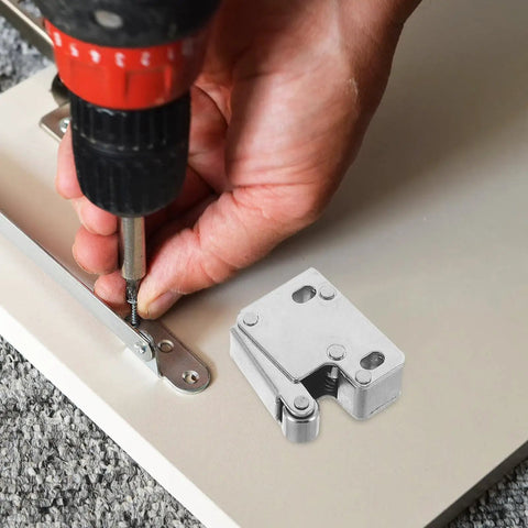 Installing stainless steel cabinet roller catch latches with anticollision beads for handleless access in kitchen cabinets